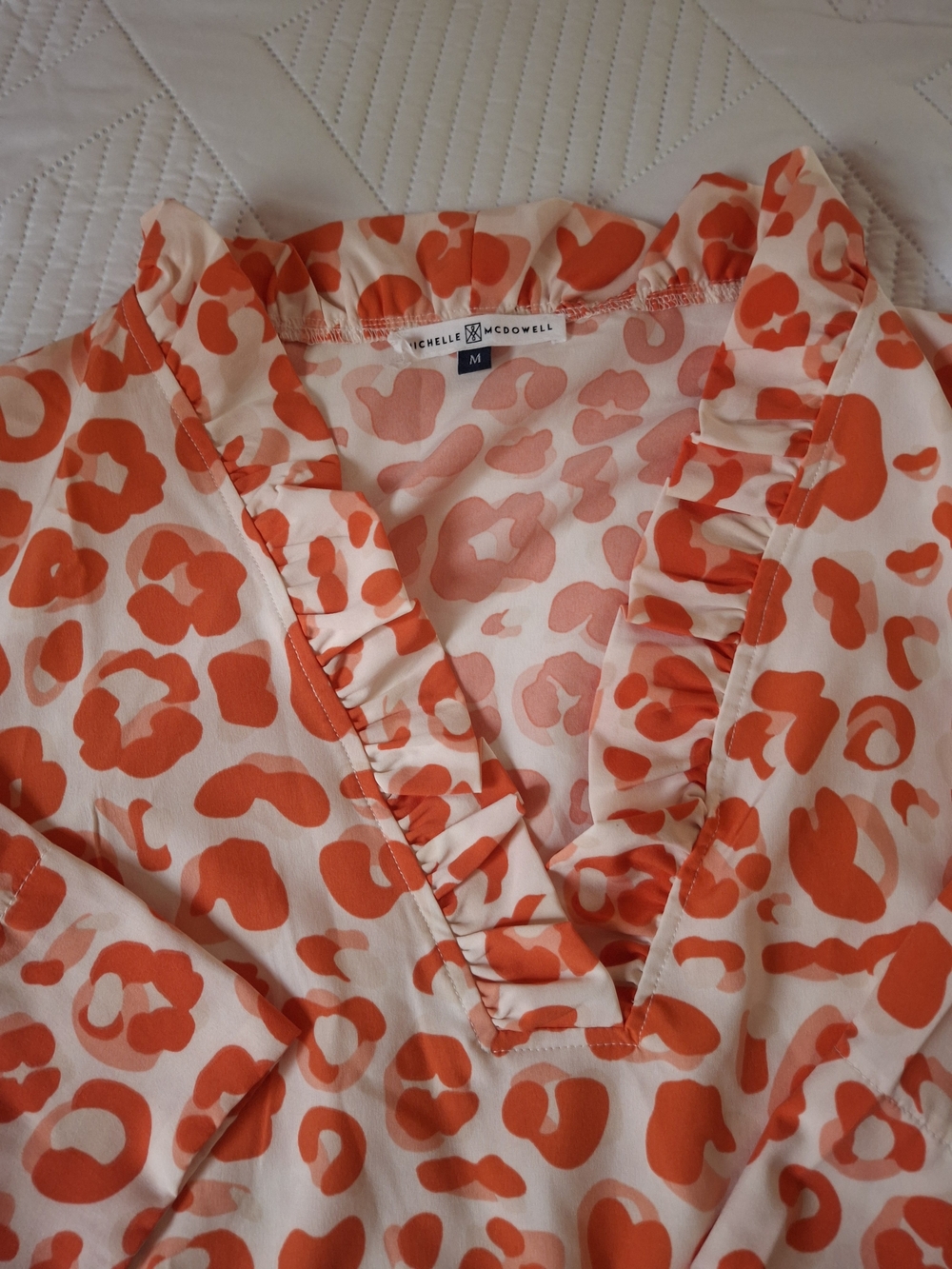 MICHELLE McDOWELL Orange Print Ruffle V-Neck Top